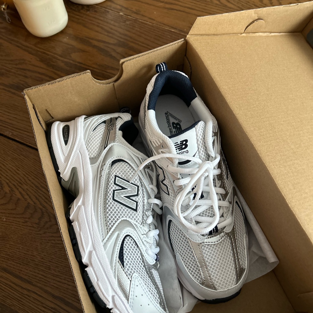 New Balance White And Black Athletic Shoes